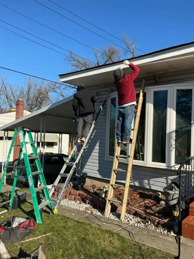 Restoration crew performing exterior repair in North Bend